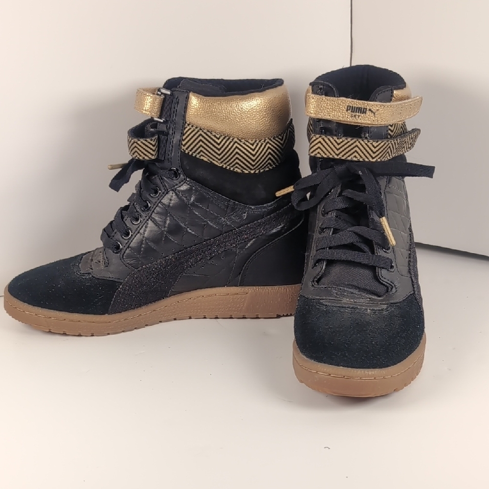 Puma Women's Black and Gold High-Top Sneakers Vintage